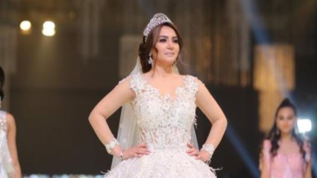 دينا فؤاد تلف الأنظار لها بفستان زفاف 2019 بأحد عروض الأزياء